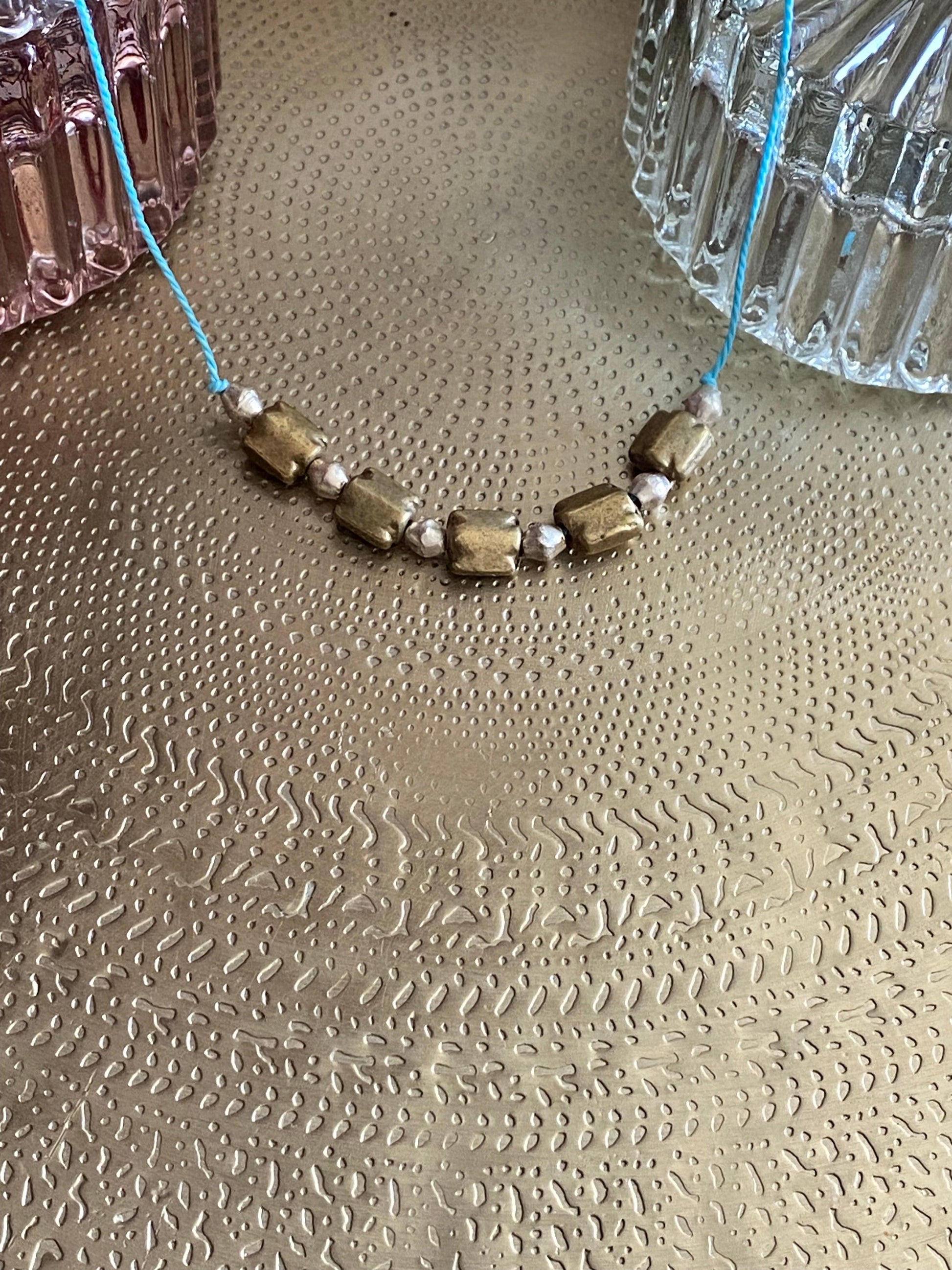COLLIER "BABY OASIS" LESE-MAJESTE
