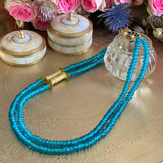 Copie de COLLIER" PETRA" - Bleu pétrole transparent Lèse-Majesté