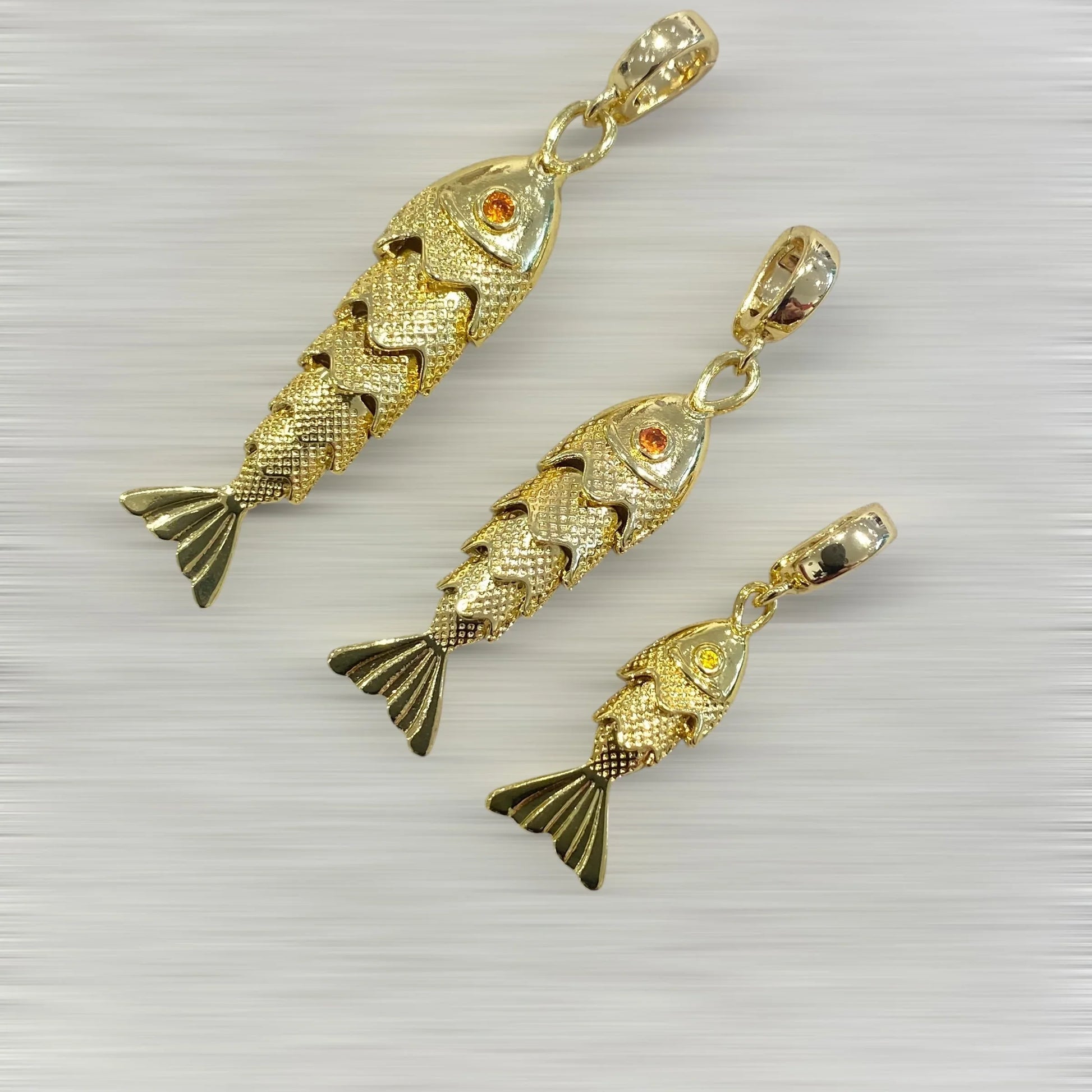 AMULETTE POISSON LIBERTÉ (doré / grand 5 cm) Lèse-Majesté