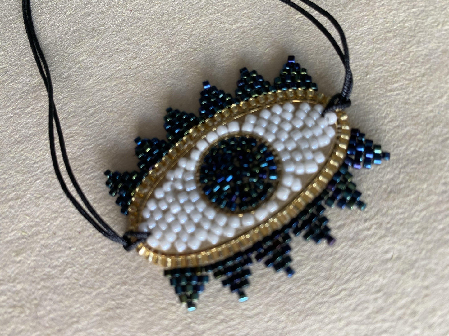 Bracelet perles tissées - "BIG EYE" Blanc/Noir LESE-MAJESTE