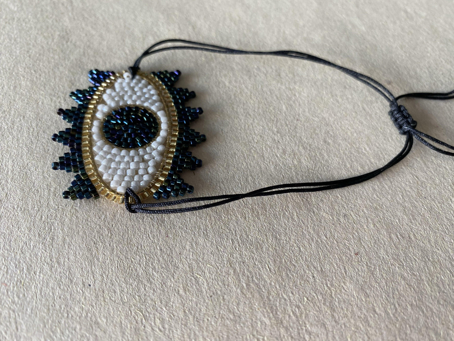 Bracelet perles tissées - "BIG EYE" Blanc/Noir LESE-MAJESTE